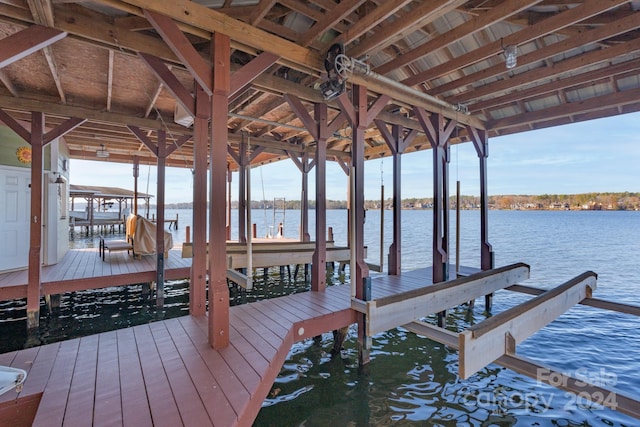 view of dock with a water view