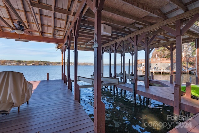 dock area featuring a water view