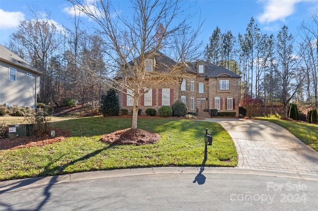 view of front of house with a front lawn