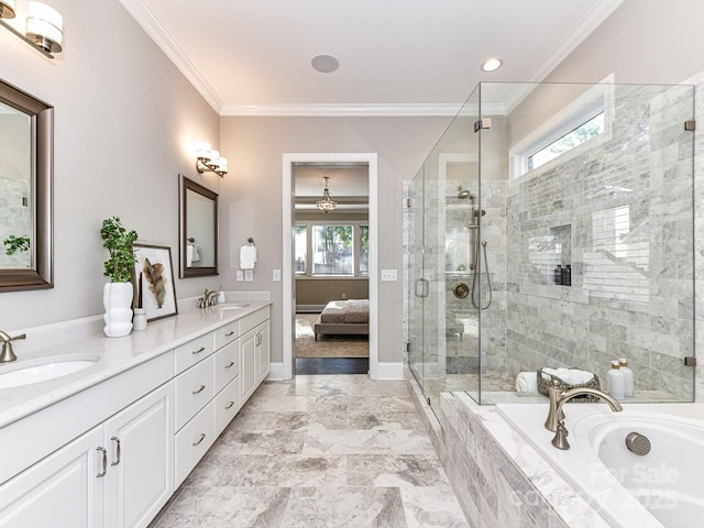 bathroom with plus walk in shower, crown molding, and vanity