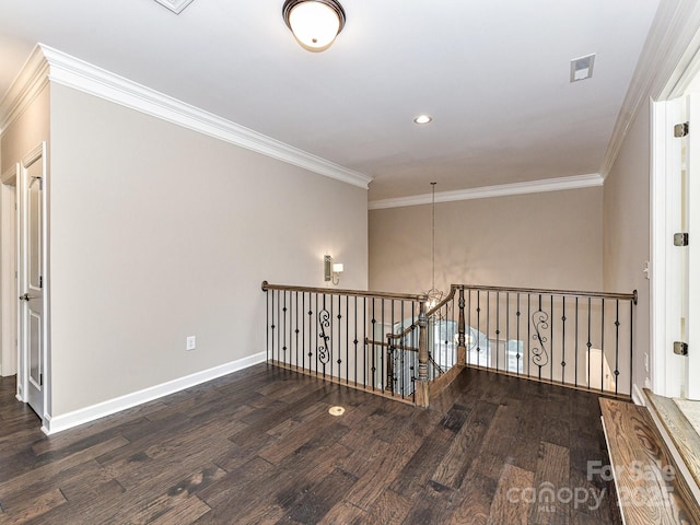 hallway with crown molding and dark wood-type flooring