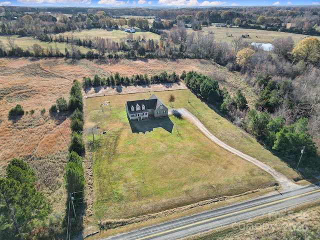 birds eye view of property featuring a rural view