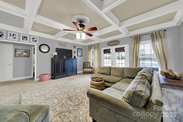living area featuring french doors, carpet floors, baseboards, and coffered ceiling