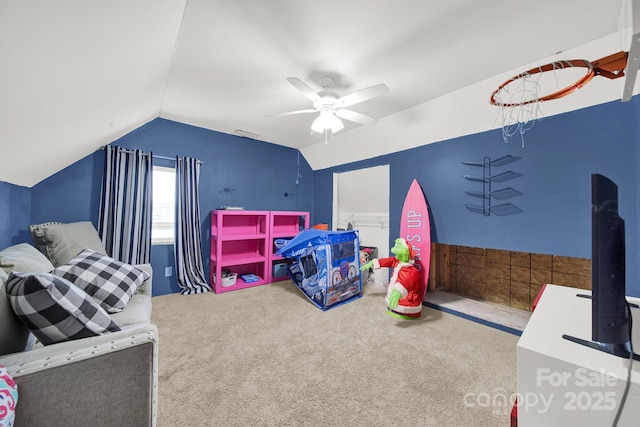 carpeted bedroom featuring visible vents, ceiling fan, and lofted ceiling