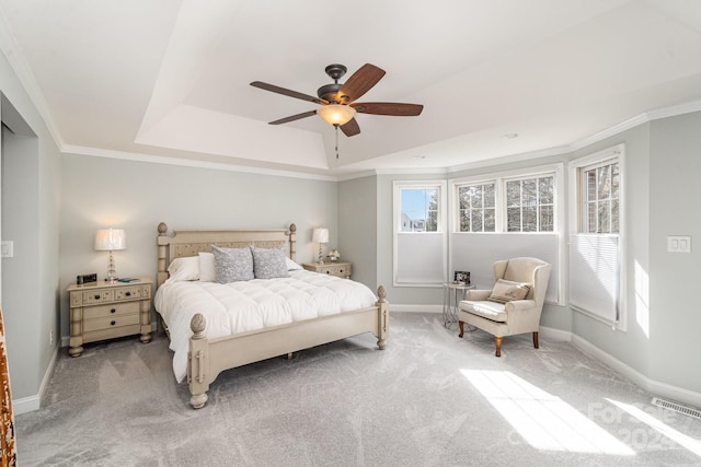 bedroom with crown molding and carpet