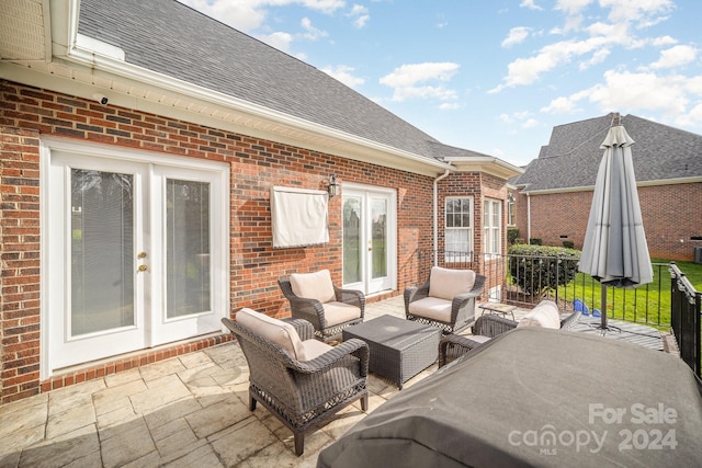 view of patio / terrace featuring french doors