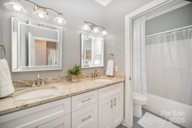 180 Sink Farm Rd, Mooresville, NC 28115 - bathroom featuring toilet, double vanity, shower / bath combo with shower curtain, and a sink