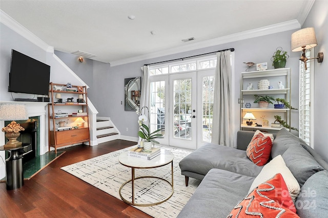 living room featuring crown molding and dark wood-type flooring