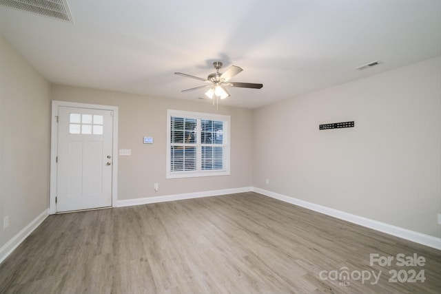 foyer featuring ceiling fan and hardwood / wood-style floors