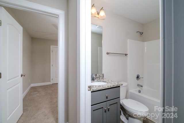 full bathroom with vanity, shower / bath combination, and toilet