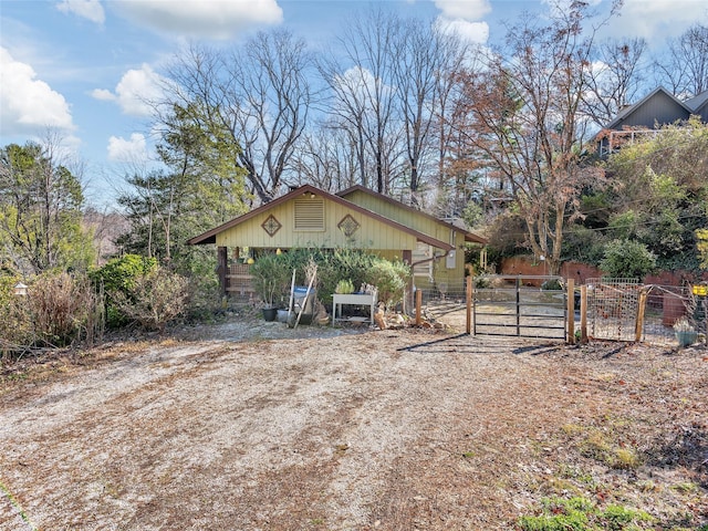 exterior space with a gate and fence