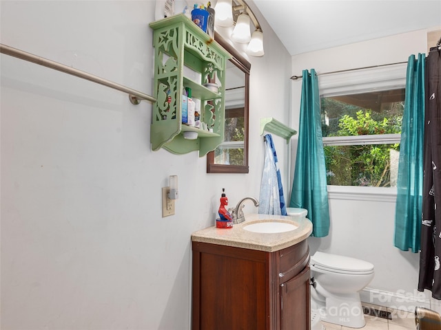 bathroom with visible vents, toilet, tile patterned flooring, and vanity