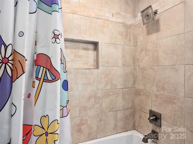 bathroom featuring shower / bath combination with curtain