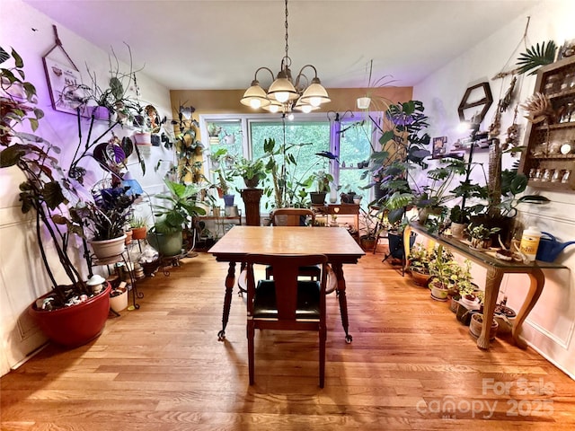 81 Jericho Dr, Tryon, NC 28782 - dining area with a chandelier and light wood-style floors