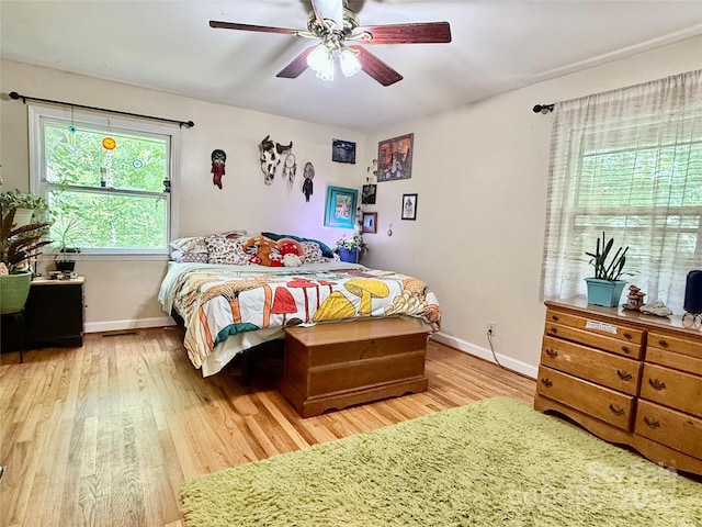81 Jericho Dr, Tryon, NC 28782 - bedroom featuring wood finished floors and a ceiling fan
