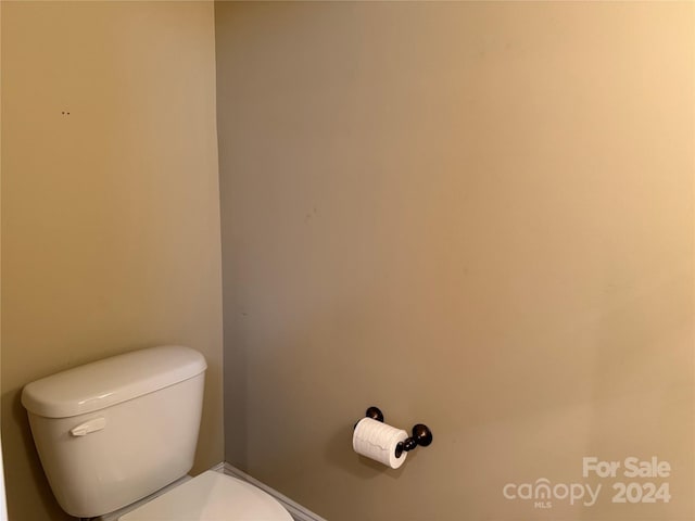 bathroom featuring toilet