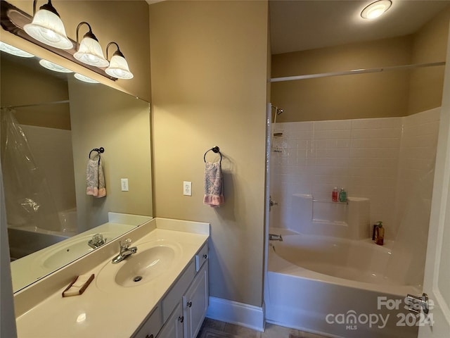 bathroom featuring vanity and tub / shower combination