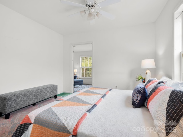 bedroom featuring carpet and ceiling fan