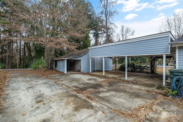 garage with a carport