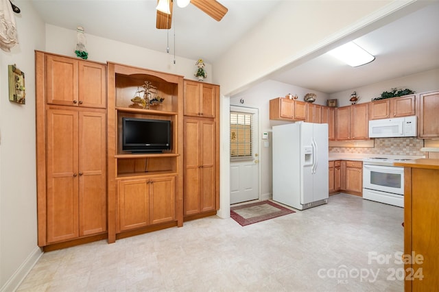 kitchen with ceiling fan, white appliances, and backsplash