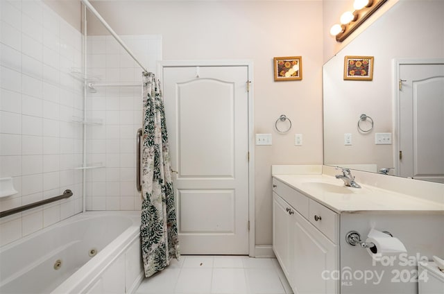 bathroom featuring tile patterned floors, shower / bath combo, and vanity