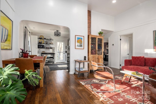 living room with dark wood-type flooring