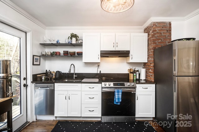 kitchen with dark hardwood / wood-style flooring, stainless steel appliances, crown molding, sink, and white cabinetry