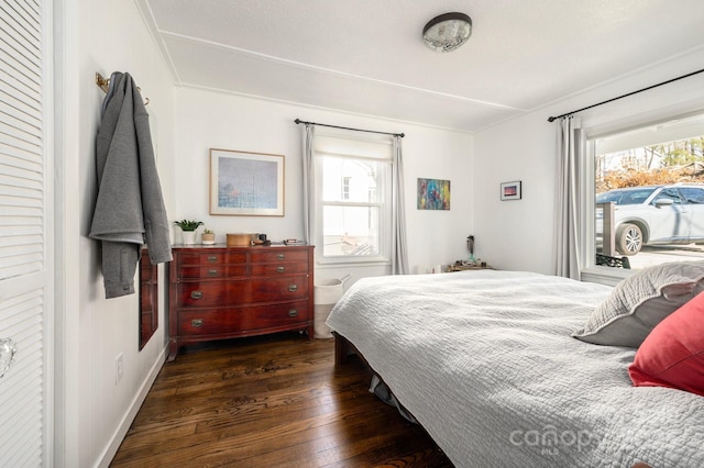 bedroom featuring dark wood-type flooring