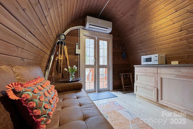 unfurnished living room featuring french doors, wood ceiling, a wall unit AC, wooden walls, and lofted ceiling