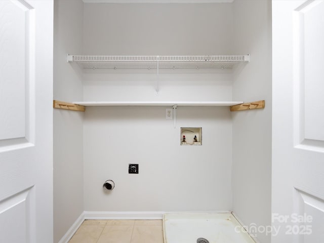 clothes washing area with washer hookup and hookup for an electric dryer