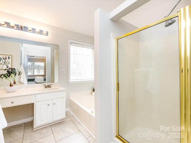 bathroom with shower with separate bathtub, tile patterned floors, and vanity