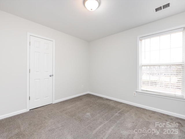 view of carpeted spare room