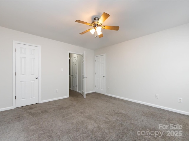 unfurnished bedroom featuring carpet flooring and ceiling fan