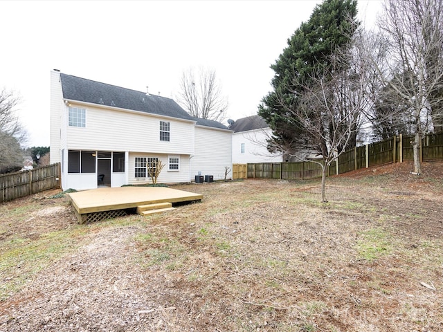 rear view of house with a deck