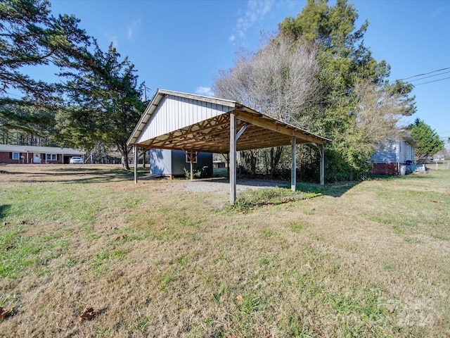 view of yard featuring a carport