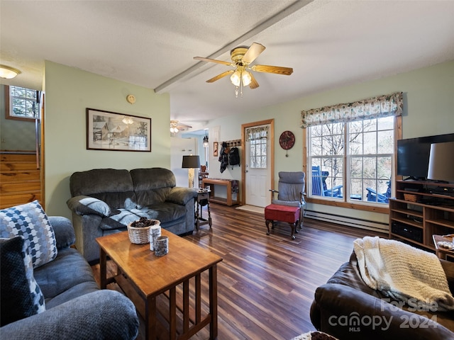 living room featuring a textured ceiling, ceiling fan, dark wood-type flooring, and a baseboard radiator