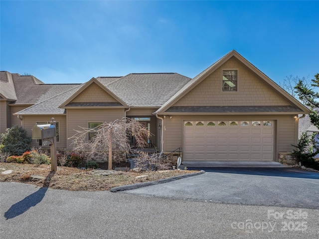 20 Red Plum Ln, Black Mountain, NC 28711 - craftsman-style home featuring a garage, roof with shingles, and aphalt driveway