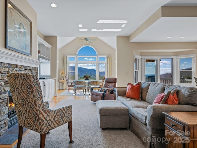 20 Red Plum Ln, Black Mountain, NC 28711 - living room with a fireplace, light wood finished floors, lofted ceiling, recessed lighting, and a ceiling fan