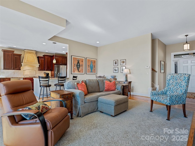 20 Red Plum Ln, Black Mountain, NC 28711 - living room with light wood-style flooring, stairs, baseboards, and recessed lighting