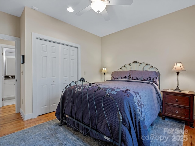 20 Red Plum Ln, Black Mountain, NC 28711 - bedroom with a closet, ceiling fan, baseboards, and wood finished floors
