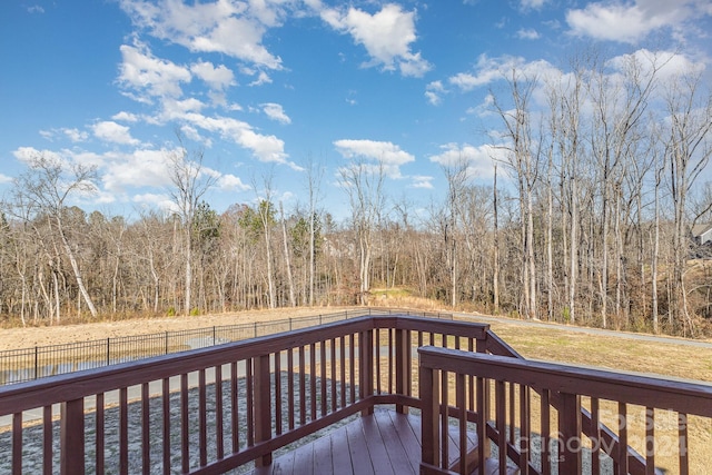 deck featuring a yard