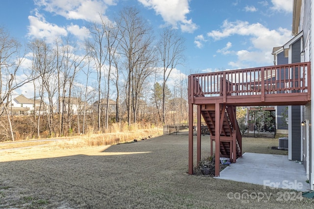 view of yard featuring a wooden deck