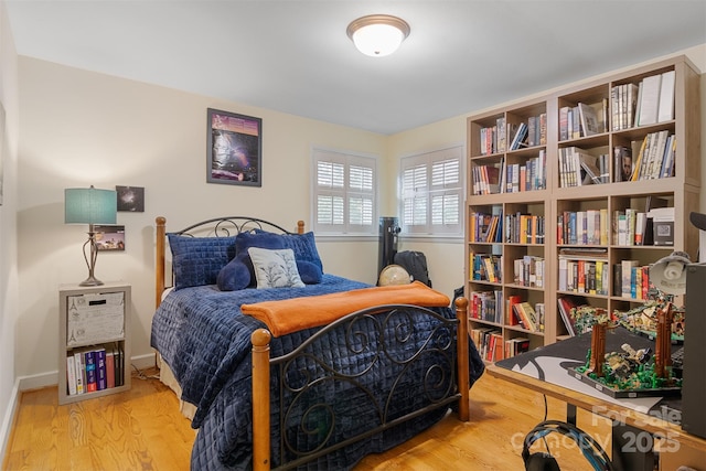 bedroom featuring hardwood / wood-style flooring