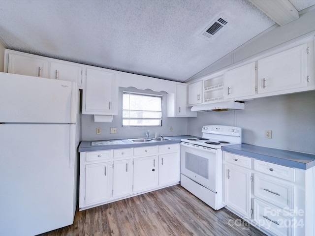 kitchen featuring white cabinets, light wood-type flooring, and white appliances