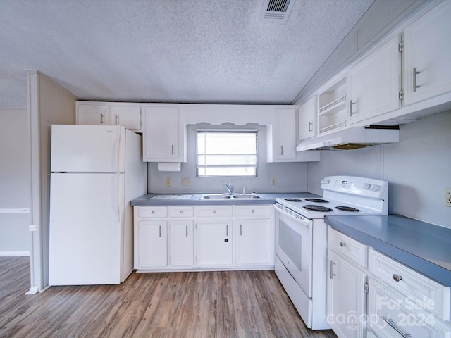 kitchen featuring light wood-type flooring, a textured ceiling, white appliances, sink, and white cabinetry