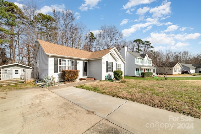 view of front of home with a front lawn