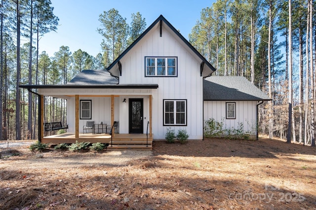 modern farmhouse with a porch