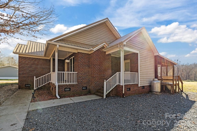 view of home's exterior with a porch