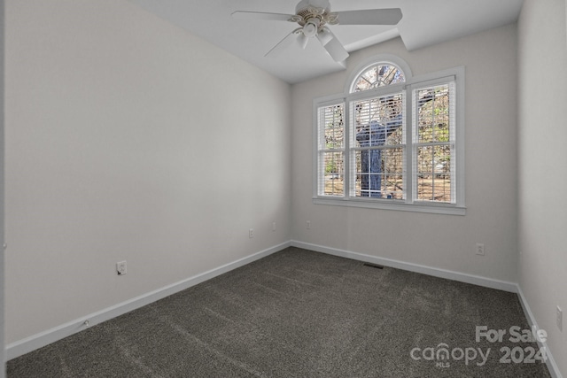 carpeted empty room with ceiling fan