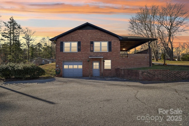 view of front of property featuring a garage